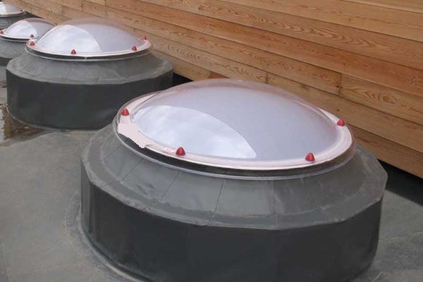 circular polycarbonate domes on roof